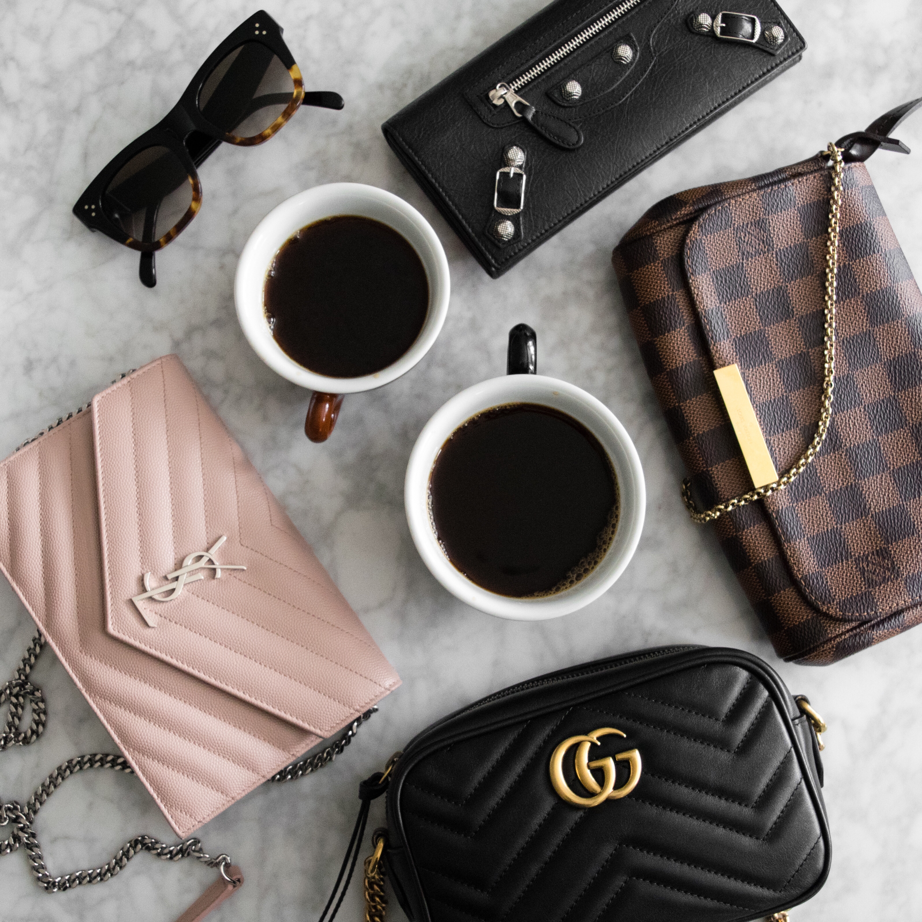 Size comparison of Gucci Marmont, Louis Vuitton Favorite, and YSL Chain Wallet