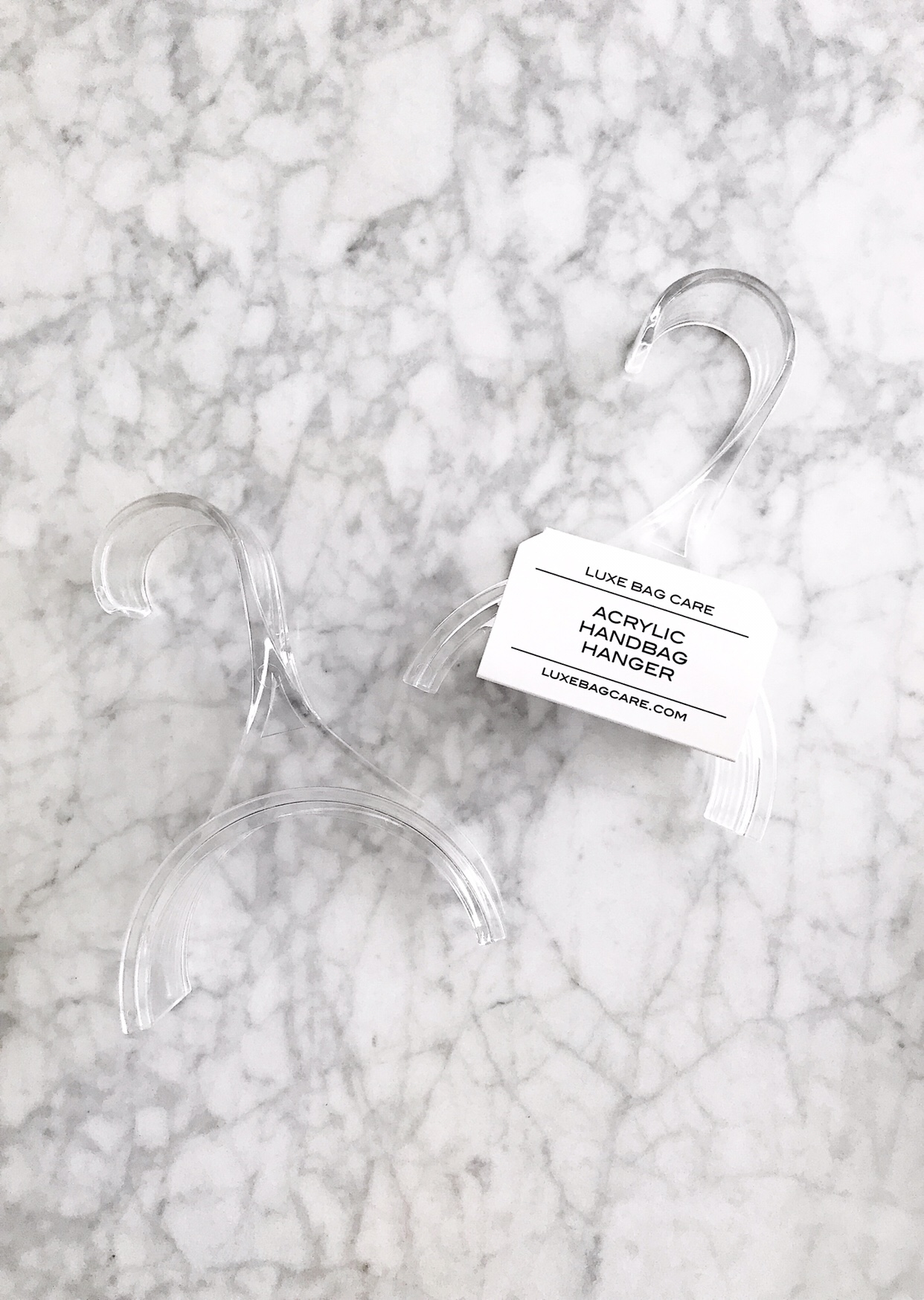 Acrylic handbag hanger in use