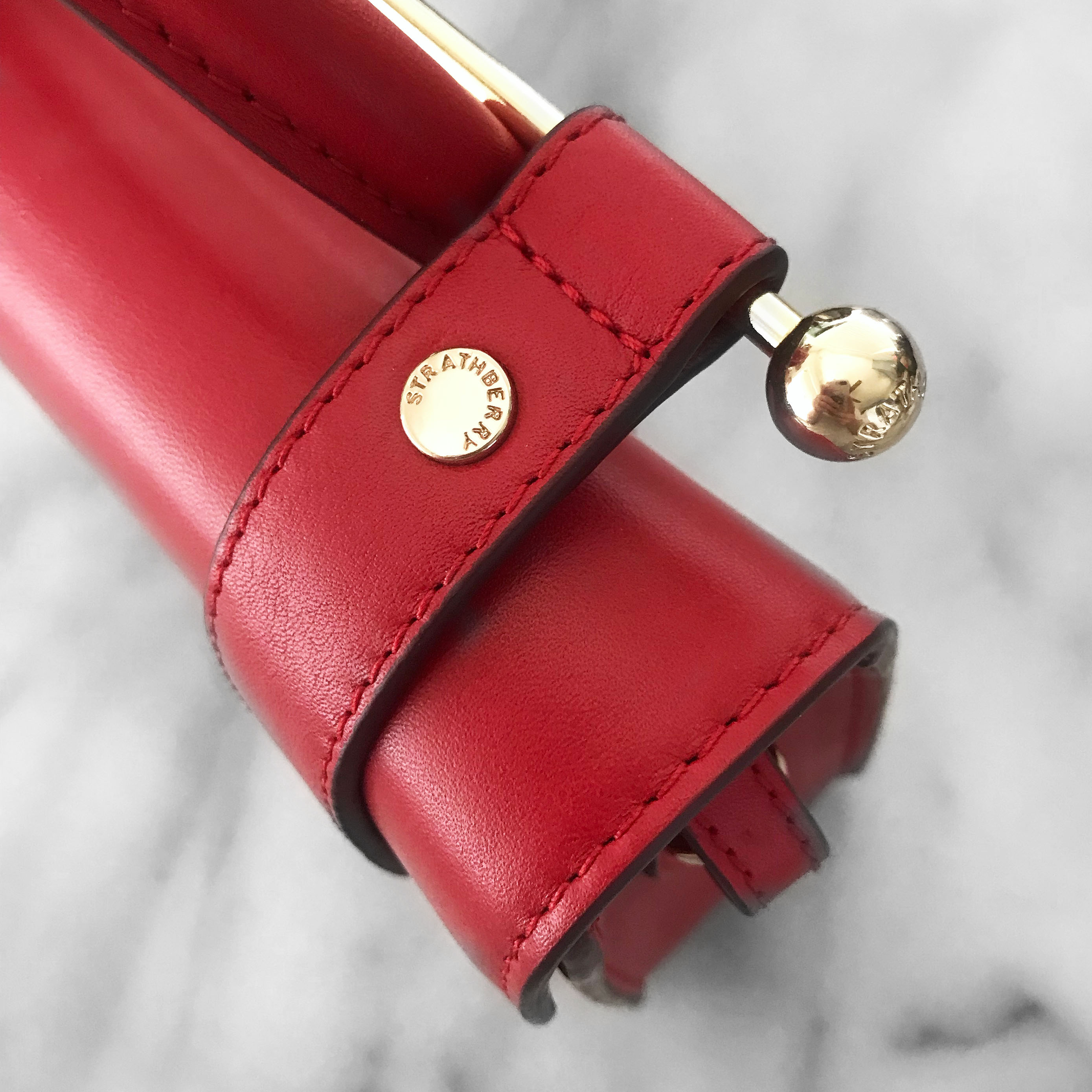 Strathberry Ruby Red MC Nano Hardware Details | CoffeeAndHandbags.com