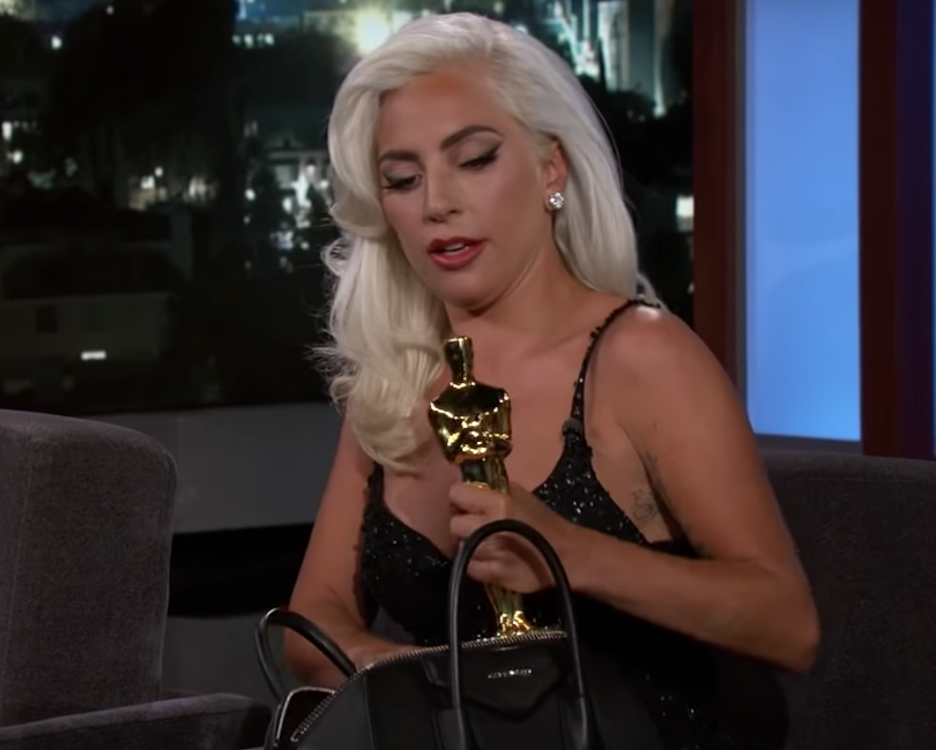 Lady Gaga on Jimmy Kimmel Live with her Oscar inside her Givenchy Antigona