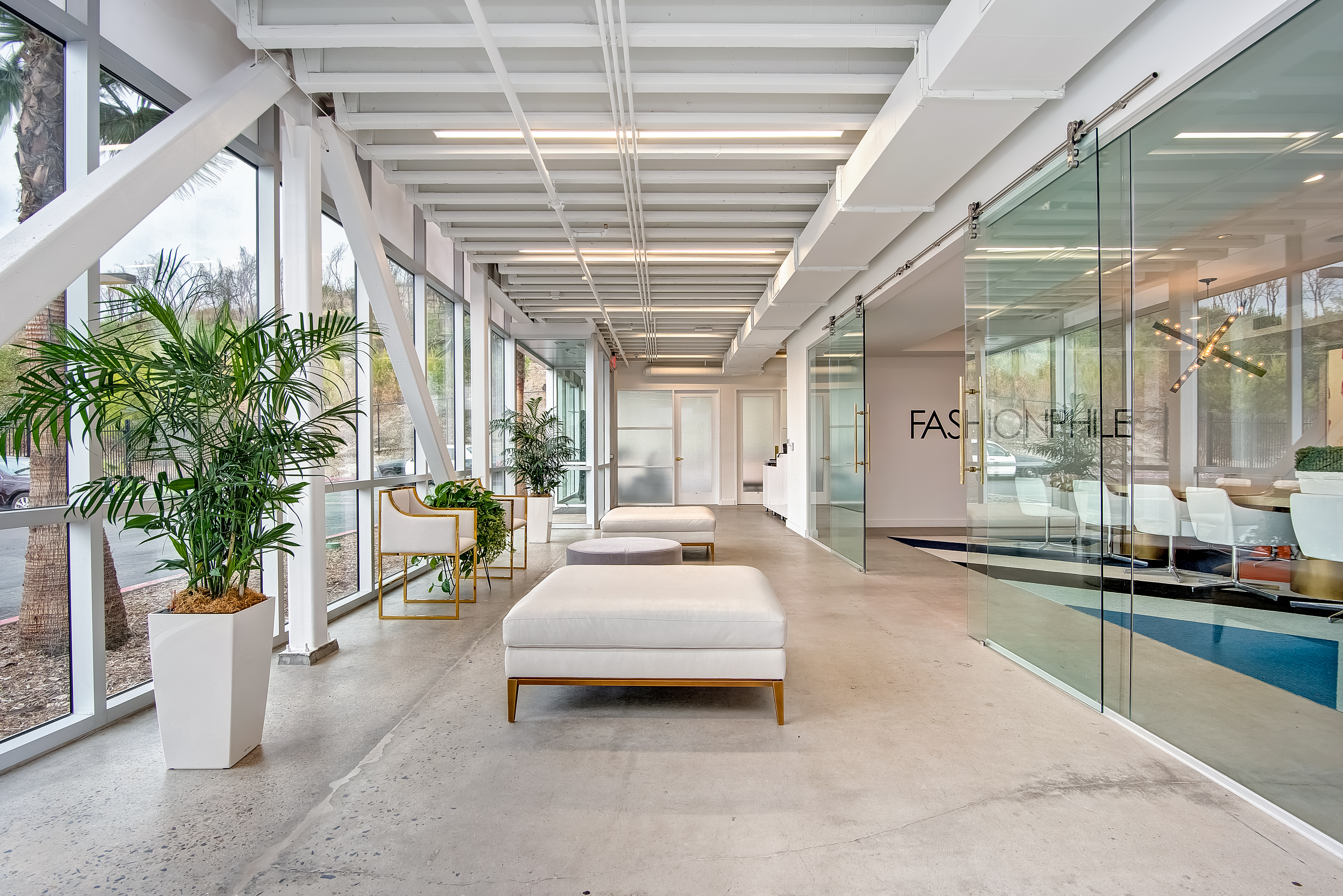 Fashionphile lobby with handbag wallpaper