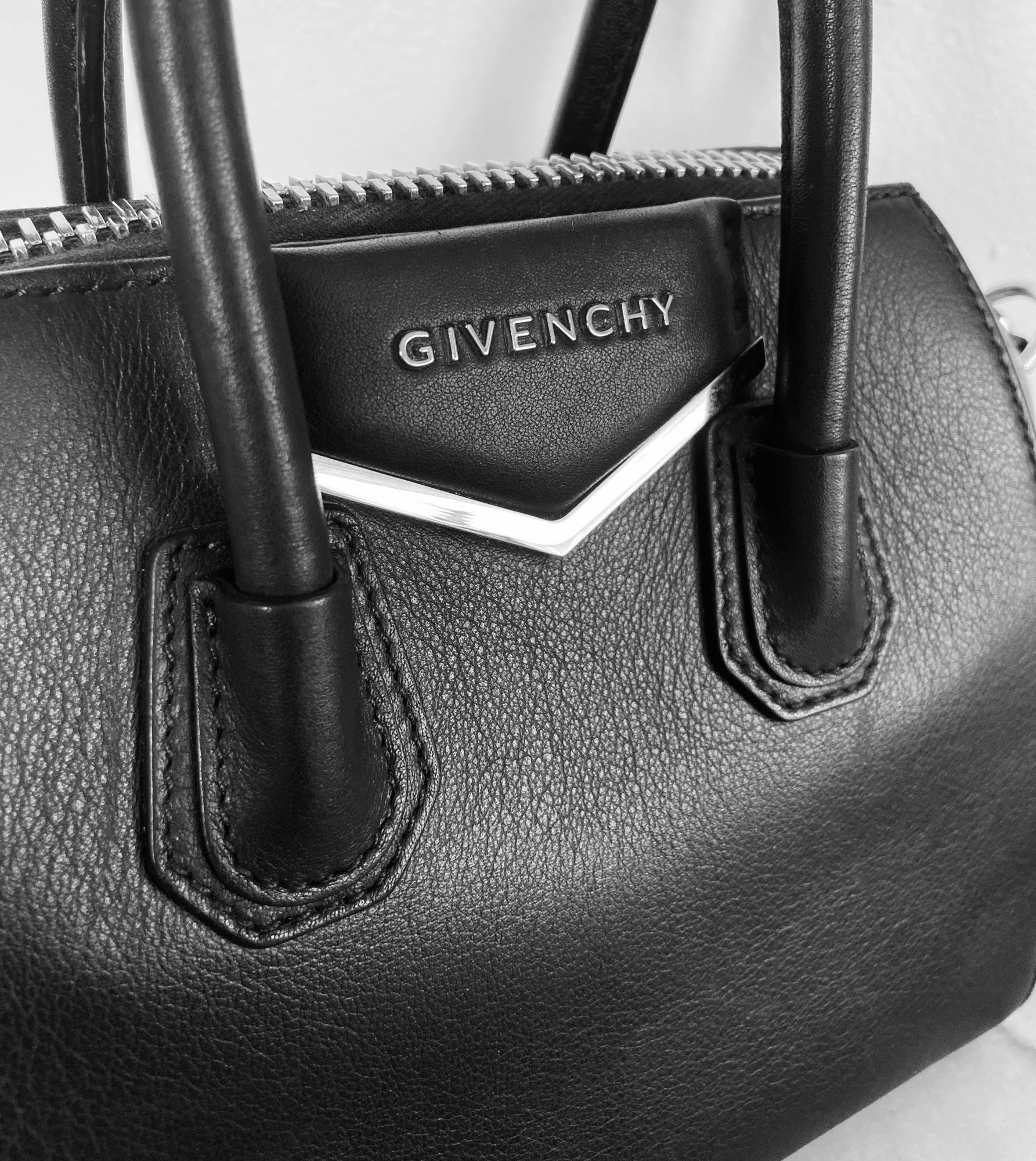 Givenchy Mini Antigona bag on table